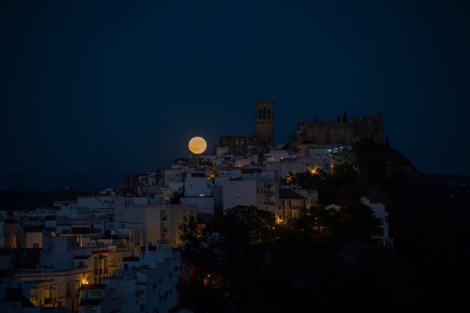 The super moon rises in Arcos de la Frontera, Spain.