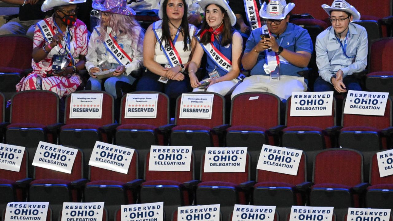 Delegates and attendees wear cowboy hats on the first day of the Democratic National Convention (DNC) at the United Center in Chicago, Illinois, on August 19, 2024. Vice President Kamala Harris will formally accept the party's nomination for president at the DNC which runs from August 19-22 in Chicago. (Photo by Eva HAMBACH / AFP) (Photo by EVA HAMBACH/AFP via Getty Images)