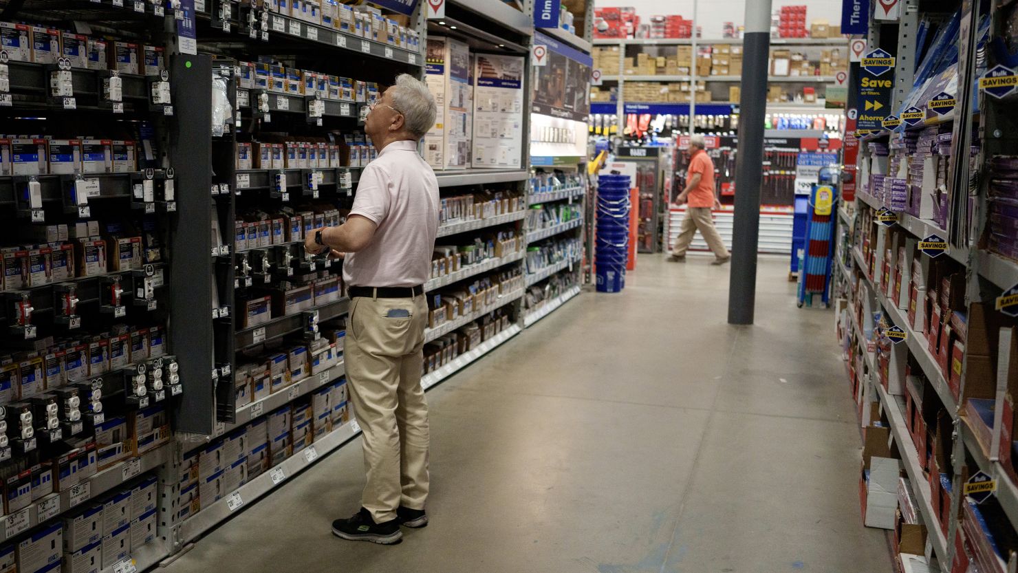 A customer shops in a Lowe's home improvement store on August 20 in Los Angeles.