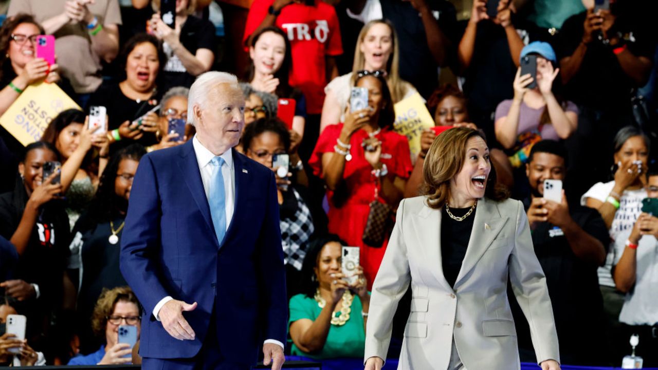 LARGO, MARYLAND - AUGUST 15: U.S. President Joe Biden and U.S. Vice President Kamala Harris walk onstage at Prince George’s Community College on August 15, 2024 in Largo, Maryland. Biden and Harris held the event to talk about their administration's efforts to lower drug costs. This event is the first time President Biden and Vice President Harris have appeared in public together since Biden announced he would be stepping down from running for re-election. (Photo by Anna Moneymaker/Getty Images)