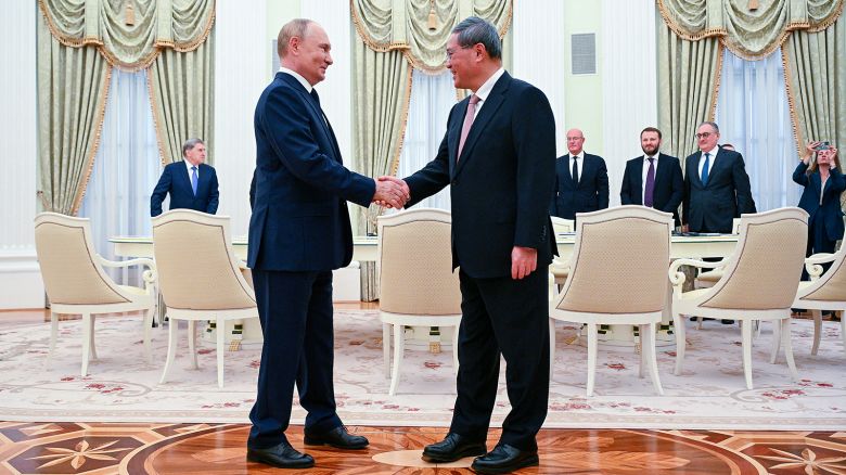 Russia's President Vladimir Putin meets Chinese Premier Li Qiang in Moscow on August 21.