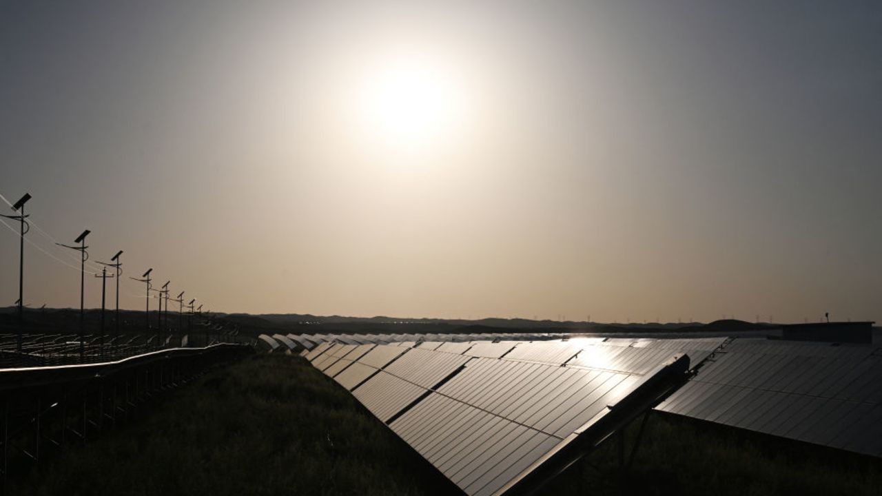 Solar panels are seen at the Tengger Desert Solar Park in China's northern Ningxia region on August 21, 2024. (Photo by GREG BAKER / AFP) (Photo by GREG BAKER/AFP via Getty Images)