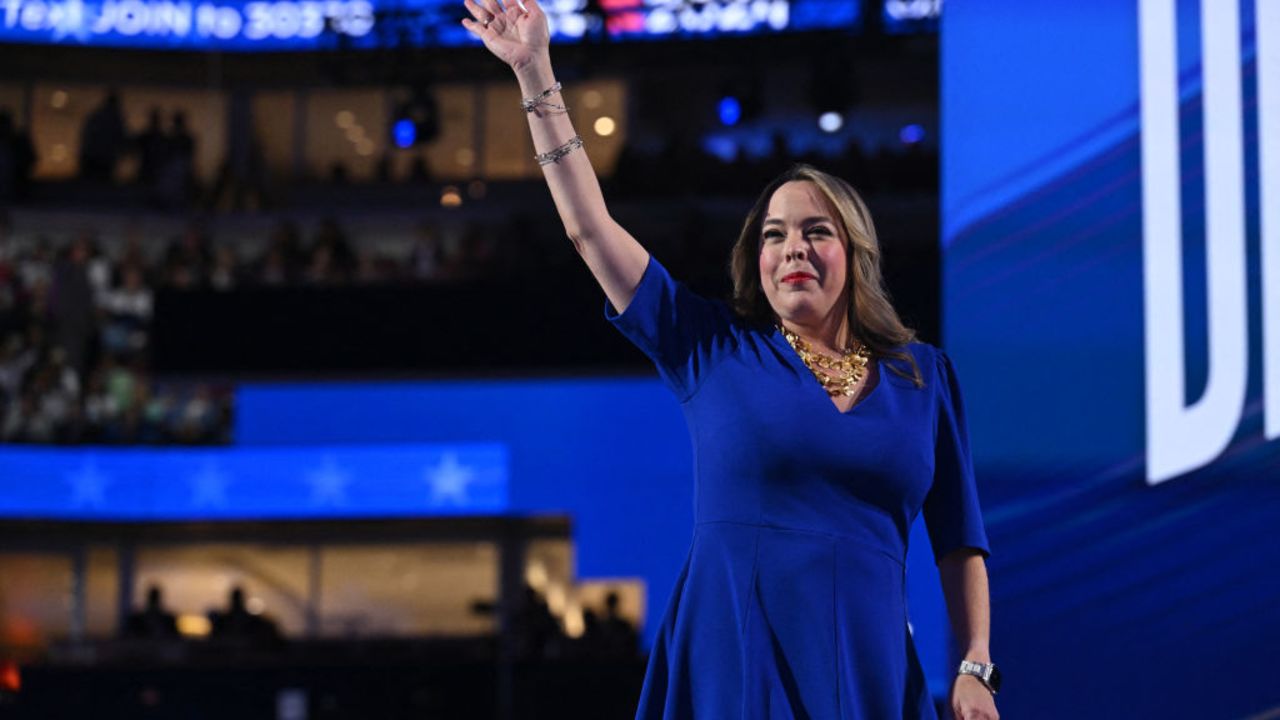 Former Trump administration national security official Olivia Troye waves as she leaves the stage after speaking on the third day of the Democratic National Convention (DNC) at the United Center in Chicago, Illinois, on August 21, 2024. Vice President Kamala Harris will formally accept the party's nomination for president at the DNC which runs from August 19-22 in Chicago. (Photo by SAUL LOEB / AFP) (Photo by SAUL LOEB/AFP via Getty Images)