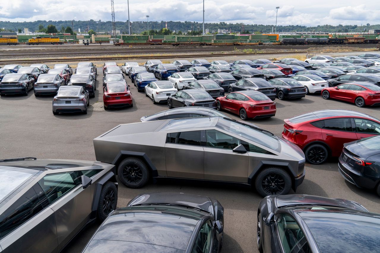 Tesla vehicles are parked at a logistics drop zone in Seattle, Washington, on August 22.