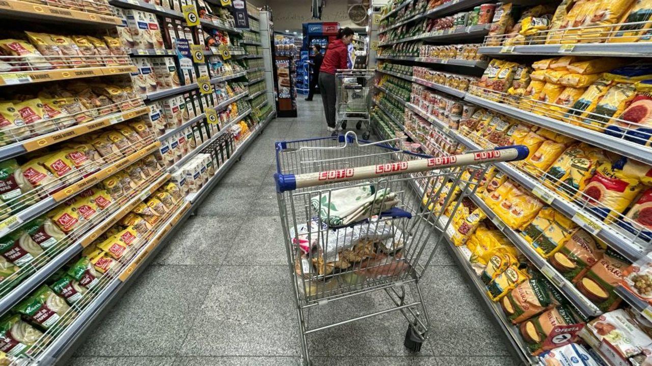 People buy groceries at a supermarket in Buenos Aires, on August 23, 2024. (Photo by STRINGER / AFP) (Photo by STRINGER/AFP via Getty Images)