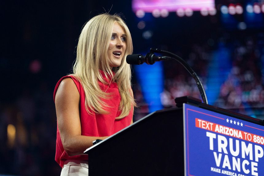 Former competitive swimmer Riley Gaines speaks during a campaign rally for Donald Trump in 2024.