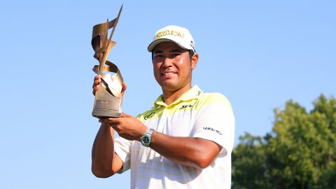 Hideki Matsuyama of Japan poses with the trophy after winning the FedEx St. Jude Championship at TPC Southwind on August 18, 2024 in Memphis, Tennessee.