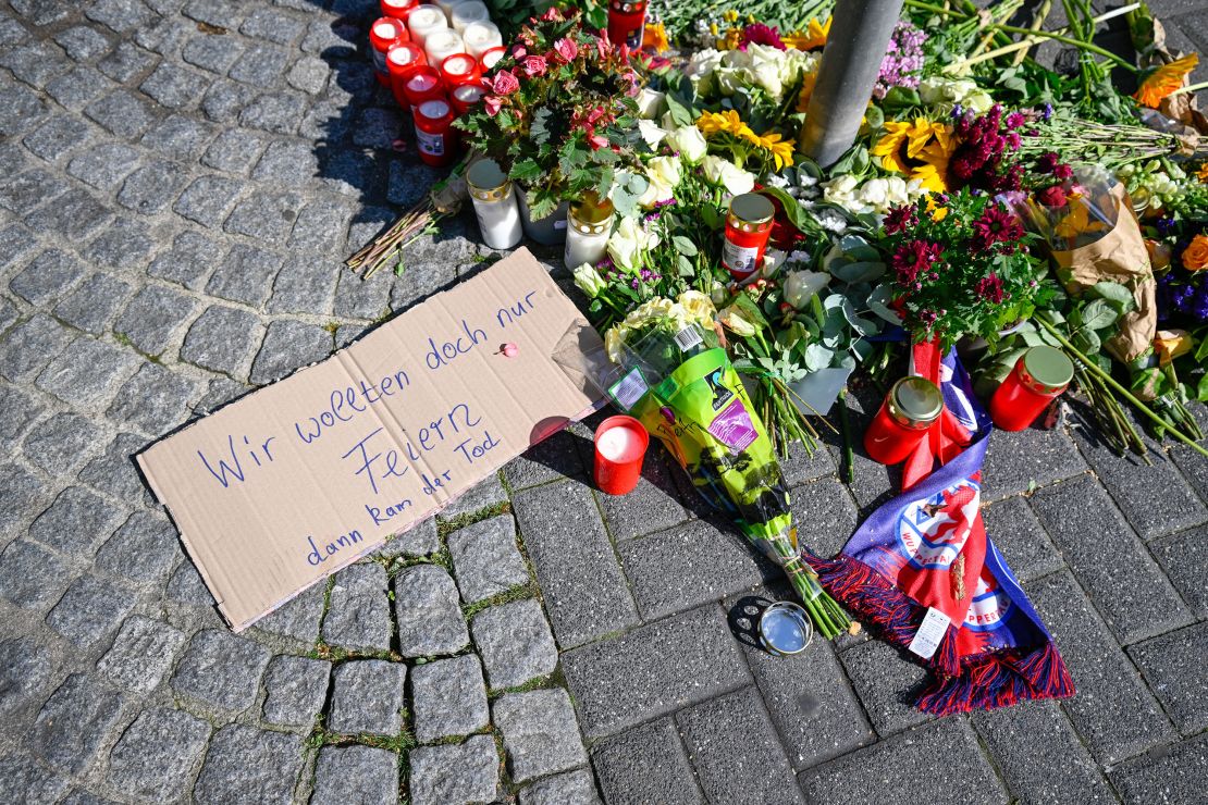 Flowers, candles and tributes near to the site of stabbings that left three dead and eight injured on August 24, 2024 in Solingen, Germany.