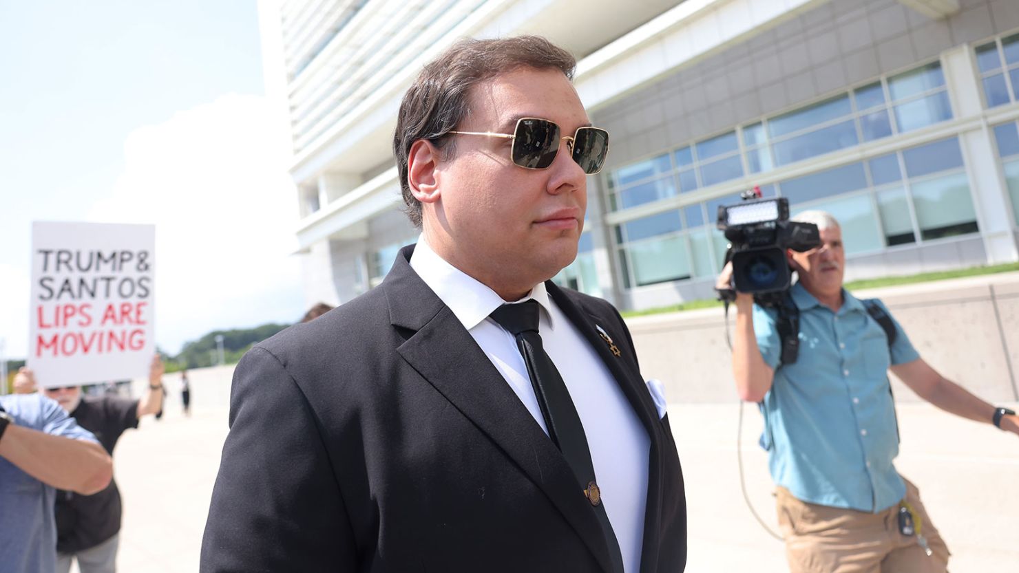 Former U.S. Rep. George Santos arrives for a court hearing at U.S. District Court Eastern District of New York Long Island Courthouse on August 19, 2024.