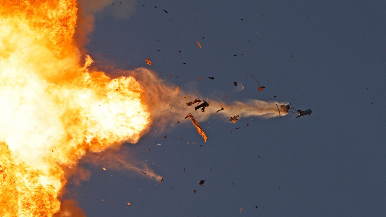 This photo taken from a position in northern Israel shows a Hezbollah UAV (unmanned aerial vehicle) intercepted by Israeli air forces over north Israel on August 25, 2024. The Israeli military announced early August 25, 2024 that it was conducting pre-emptive strikes in Lebanon after detecting preparations for "large-scale" attacks by the Iran-backed militant group Hezbollah. Hezbollah said August 25, 2024 it had launched more than 320 rockets at Israel overnight, targeting a string of military positions, even as Israel's military said it was carrying out pre-emptive strikes against the group.