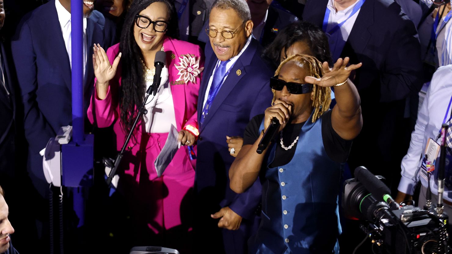 CHICAGO, ILLINOIS - AUGUST 20: Rapper Lil Jon (R) performs with the Georgia delegation during the Ceremonial Roll Call of States on the second day of the Democratic National Convention at the United Center on August 20, 2024 in Chicago, Illinois. Delegates, politicians, and Democratic Party supporters are gathering in Chicago, as current Vice President Kamala Harris is named her party's presidential nominee. The DNC takes place from August 19-22. (Photo by Chip Somodevilla/Getty Images)