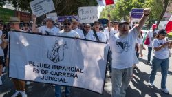 Judicial Branch workers, judges, and magistrates on an indefinite strike demonstrate in Tijuana, Baja California State, Mexico, on August 25, 2024. Judicial Branch workers, judges, and magistrates held a nation-wide protest against a controversial constitutional reform with which the leftist government seeks to have them elected by popular vote. (Photo by Guillermo Arias / AFP) (Photo by GUILLERMO ARIAS/AFP via Getty Images)