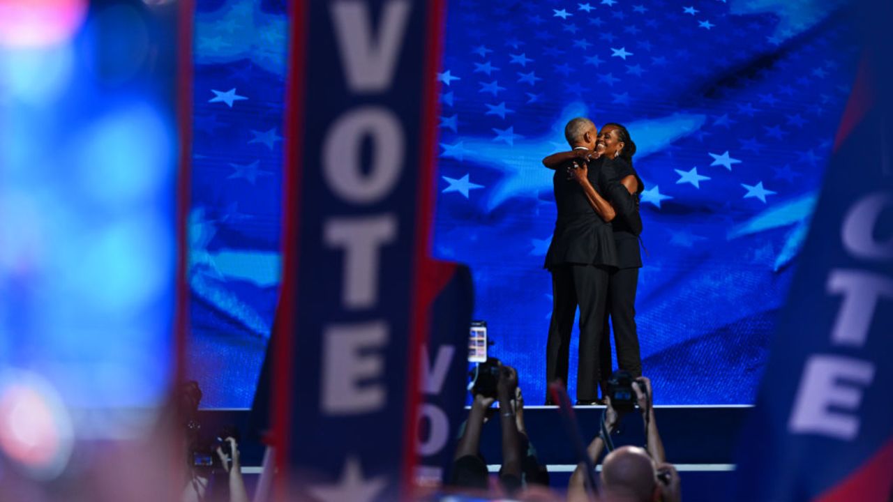 CHICAGO, ILLINOIS - AUGUST 20: Former U.S. President Barack Obama (L) greets former first lady Michelle Obama as he arrives to speak on stage during the second day of the Democratic National Convention at the United Center on August 20, 2024 in Chicago, Illinois. Delegates, politicians, and Democratic Party supporters are gathering in Chicago, as current Vice President Kamala Harris is named her party's presidential nominee. The DNC takes place from August 19-22. (Photo by Brandon Bell/Getty Images)