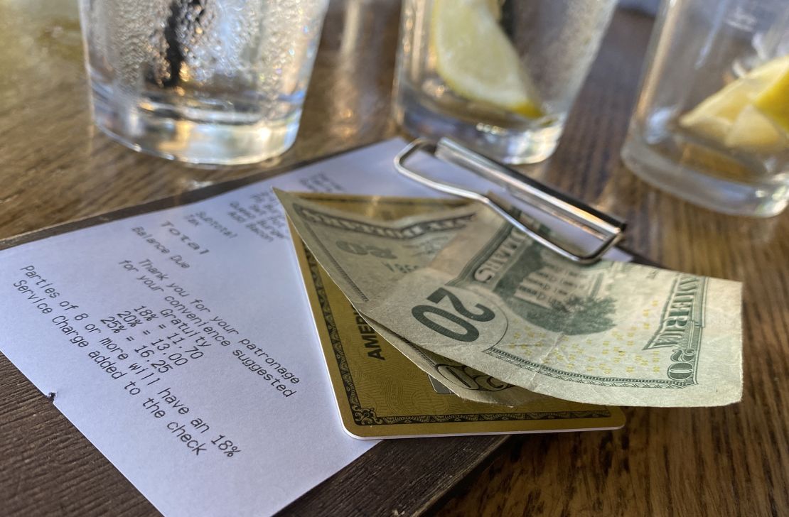 A tip ranging between 15 and 20 percent of the price is considered normal at most American restaurants.