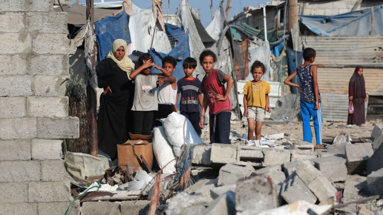 Palestinians inspect the damage following Israeli bombardment on Khan Yunis in the southern Gaza Strip on August 27, 2024, amid the ongoing conflict between Israel and the militant Hamas group. (Photo by Bashar TALEB / AFP) (Photo by BASHAR TALEB/AFP via Getty Images)