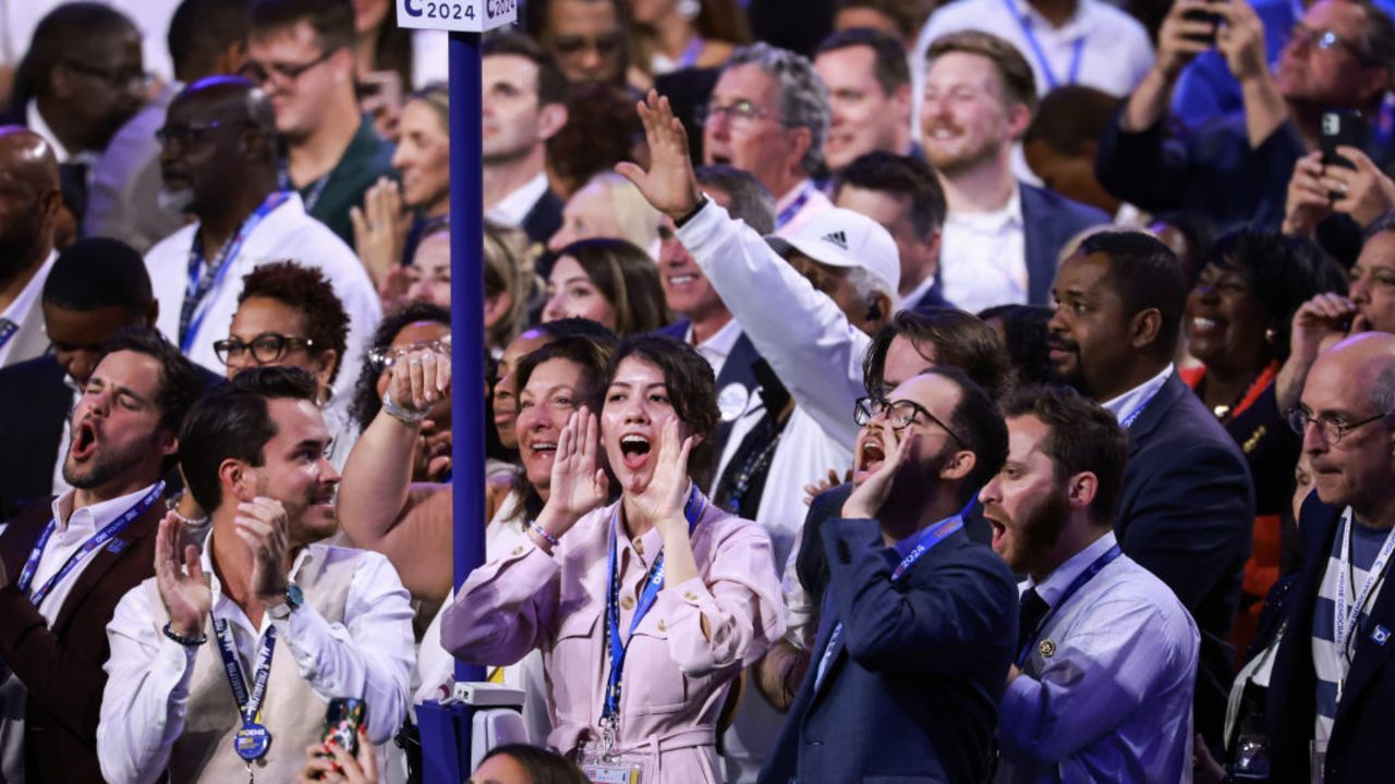 CHICAGO, ILLINOIS - AUGUST 22: Attendees cheer during the final day of the Democratic National Convention at the United Center on August 22, 2024 in Chicago, Illinois. Delegates, politicians, and Democratic Party supporters are gathering in Chicago, as current Vice President Kamala Harris is named her party's presidential nominee. The DNC takes place from August 19-22. (Photo by Joe Raedle/Getty Images)