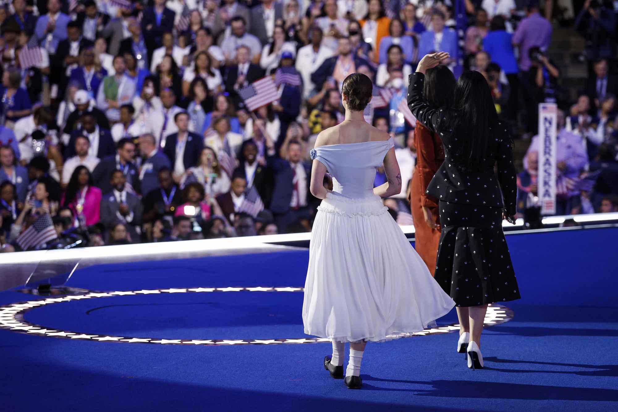 CHICAGO, ILLINOIS - AUGUST 22: Ella Emhoff, daughter of second gentleman Doug Emhoff and Vice President Kamala Harris, Meena Harris, niece of Vice President Kamala Harris, and Helena Hudlin, goddaughter of Vice President Kamala Harris, arrive to speak on stage during the final day of the Democratic National Convention at the United Center on August 22, 2024 in Chicago, Illinois. Delegates, politicians, and Democratic Party supporters are gathering in Chicago, as current Vice President Kamala Harris is named her party's presidential nominee. The DNC takes place from August 19-22. (Photo by Kevin Dietsch/Getty Images)