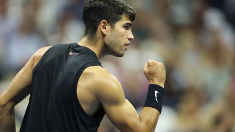 TOPSHOT - Spain's Carlos Alcaraz reacts as he plays against Australia's Li Tu during their men's singles first round match on day two of the US Open tennis tournament at the USTA Billie Jean King National Tennis Center in New York City, on August 27, 2024. (Photo by CHARLY TRIBALLEAU / AFP) (Photo by CHARLY TRIBALLEAU/AFP via Getty Images)