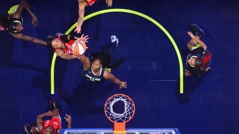 ARLINGTON, TX -  AUGUST 27:  A'ja Wilson #22 of the Las Vegas Aces goes for the rebound during the game against the Dallas Wings on August 27, 2024 at the College Park Center in Arlington, TX. NOTE TO USER: User expressly acknowledges and agrees that, by downloading and or using this photograph, User is consenting to the terms and conditions of the Getty Images License Agreement. Mandatory Copyright Notice: Copyright 2024 NBAE (Photo by Michael Gonzales/NBAE via Getty Images)