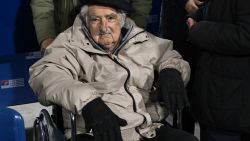 Former Uruguayan President Jose Mujica arrives at a press conference to present the formal entry of Uruguayan journalist and writer Blanca Rodriguez (out of frame) into the Frente Amplio (FA) leftist political coalition, for which she will run for the Senate under Mujica's MPP party, at the FA's headquarters in Montevideo on August 27, 2024. Former Uruguayan President José Mujica returned home on Tuesday after being hospitalized for 24 hours for a deterioration of his kidney function due to the oncological treatment he received, but "he is fragile," his personal doctor said. (Photo by Pablo PORCIUNCULA / AFP) (Photo by PABLO PORCIUNCULA/AFP via Getty Images)