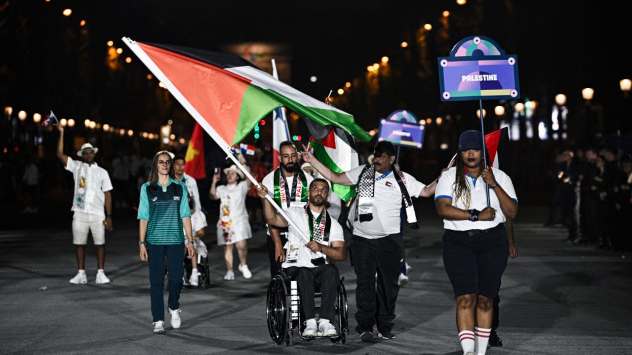 PARIS, FRANCE - AUGUST 28: Palestine's delegation arrives during the Parade of Nations as part of the Paris 2024 Paralympic Games Opening Ceremony at the Place de la Concorde on August 28, 2024 in Paris, France. (Photo by Julien de Rosa - Pool/Getty Images)