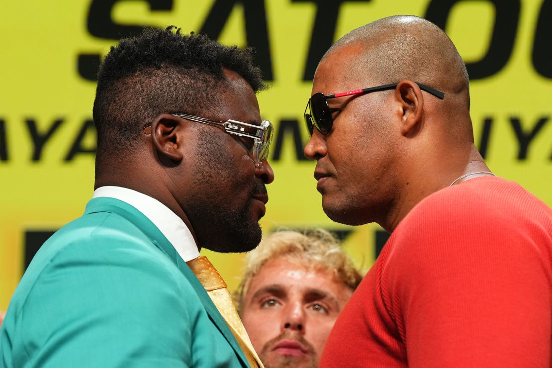 Francis Ngannou faces off with Renan Ferreira during the Battle of the Giants press conference at The Anthem on August 22 in Washington DC.