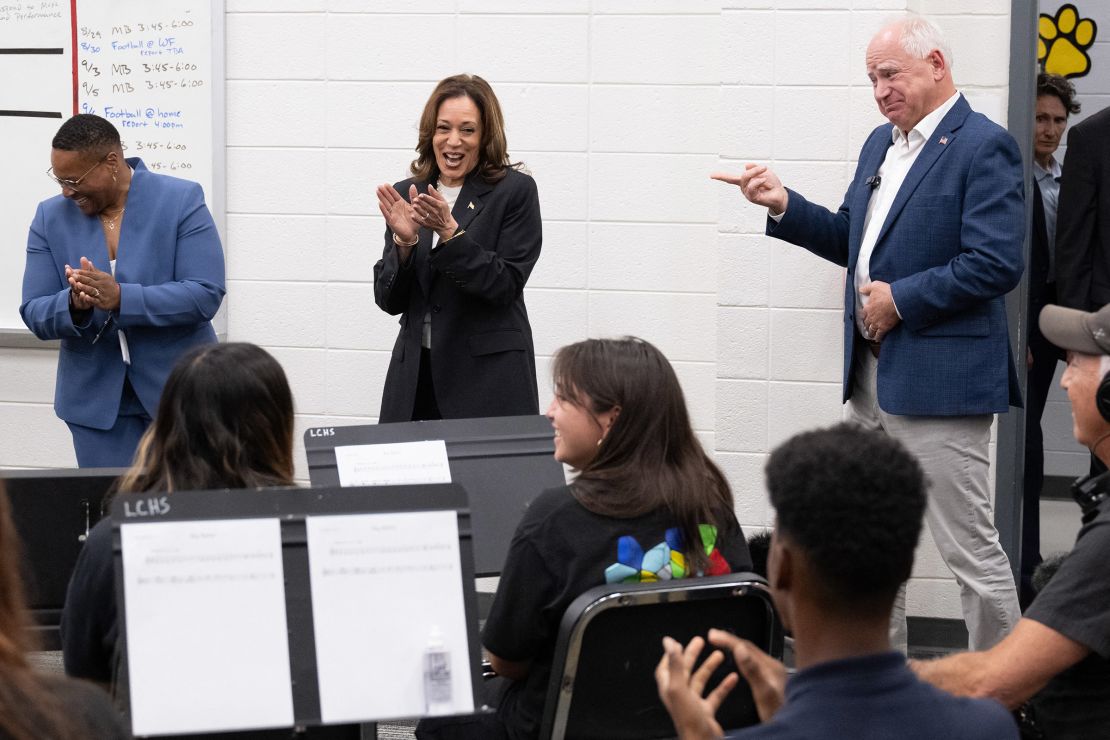 Vice President Kamala Harris and Walz visit with members of the marching band at Liberty County High School in Hinesville, Georgia, on August 28, 2024.