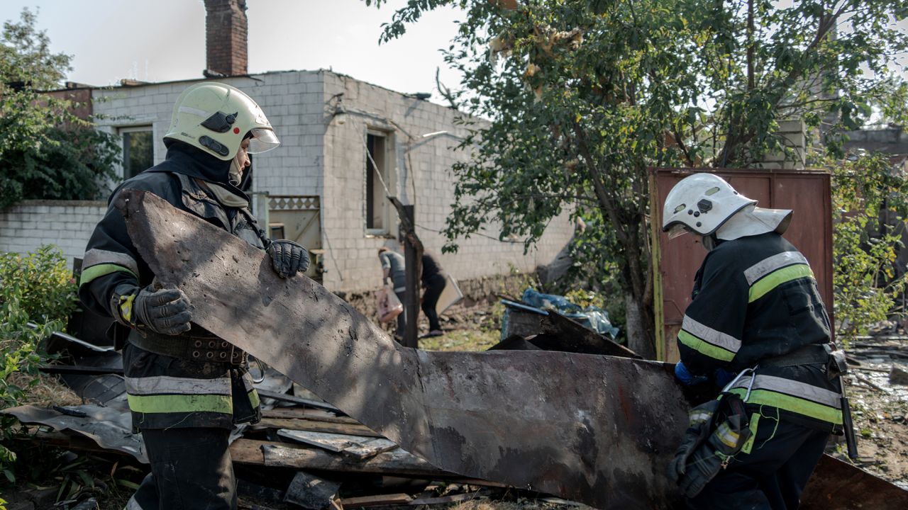 KHARKIV, UKRAINE - AUGUST 25: Rescue workers remove rubble at the site of a Russian missile strike on private residential area in the city's Slobidskyi district on August 25, 2024 in Kharkiv, Ukraine. In the early morning, the Russian army launched a missile attack on the Slobidskyi district of Kharkiv, leaving seven people injured and destroying or damaging at least 25 private residential buildings. (Photo by Ivan Samoilov/Gwara Media/Global Images Ukraine via Getty Images)