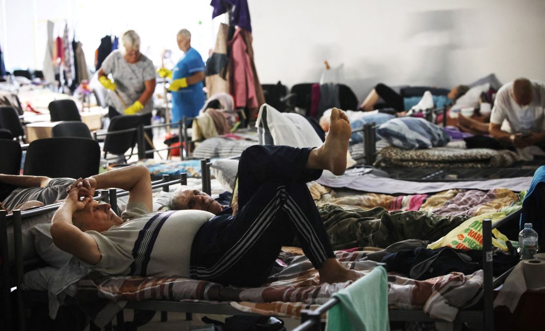 People displaced by war spend time at a displaced persons centre in an undisclosed location in the Kursk region, western Russia, following a Ukrainian cross-border attack on the region on August 29, 2024.