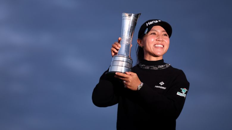 ST ANDREWS, SCOTLAND - AUGUST 25: Champion, Lydia Ko of New Zealand poses with the AIG Women's Open trophy following victory on Day Four of the AIG Women's Open at St Andrews Old Course on August 25, 2024 in St Andrews, Scotland. (Photo by Morgan Harlow/R&A/R&A via Getty Images)