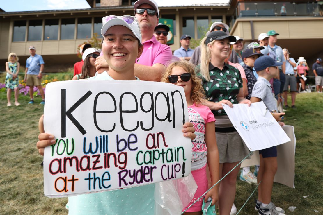 A fan holds up a sign showing support for Bradley during the final round of the BMW Championship.