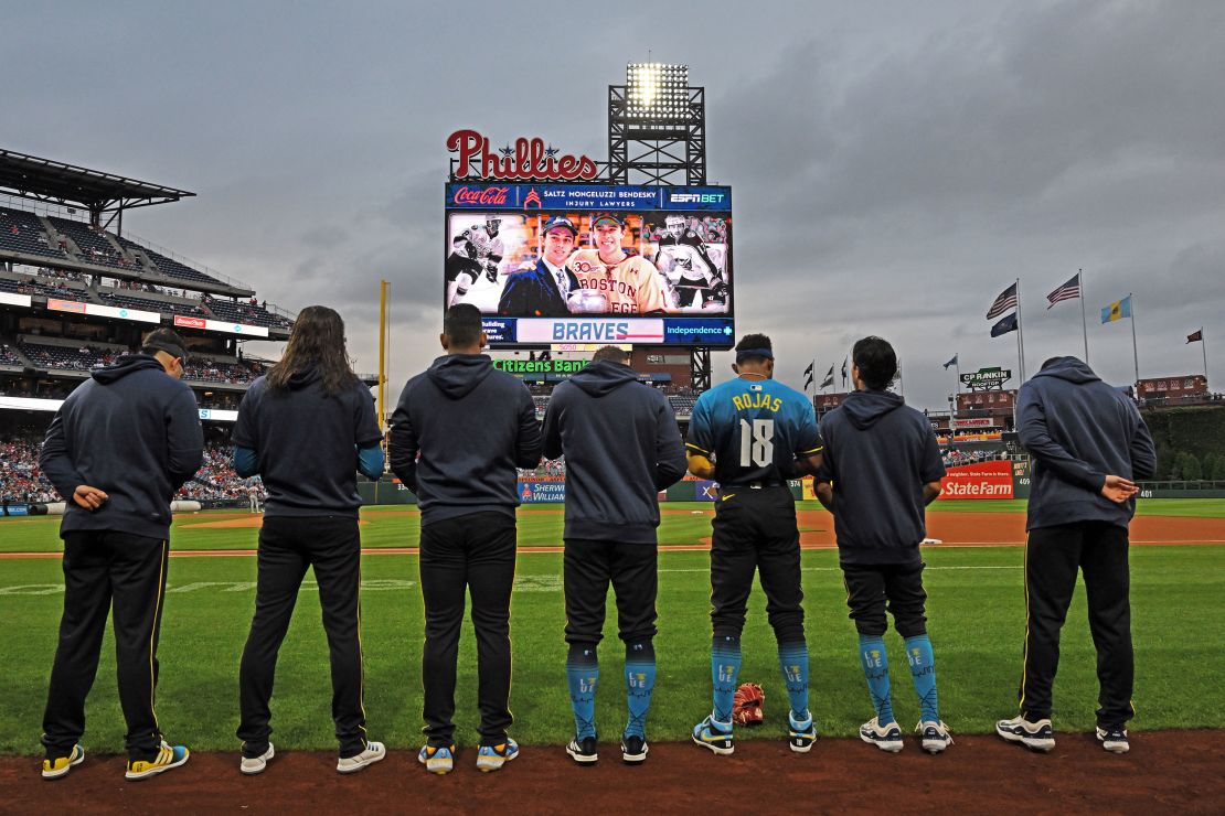 The Philadelphia Phillies observe a moment of silence in honor of the Gaudreau brothers before a game against the Atlanta Braves at Citizens Bank Park in Philadelphia on August 30.