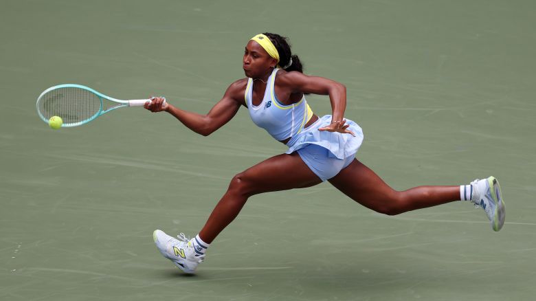 NEW YORK, NEW YORK - AUGUST 26: Coco Gauff of the United States returns against Varvara Gracheva of France during their Women's Singles First Round match on Day One of the 2024 US Open at the USTA Billie Jean King National Tennis Center on August 26, 2024 in the Flushing neighborhood of the Queens borough of New York City. (Photo by Al Bello/Getty Images)