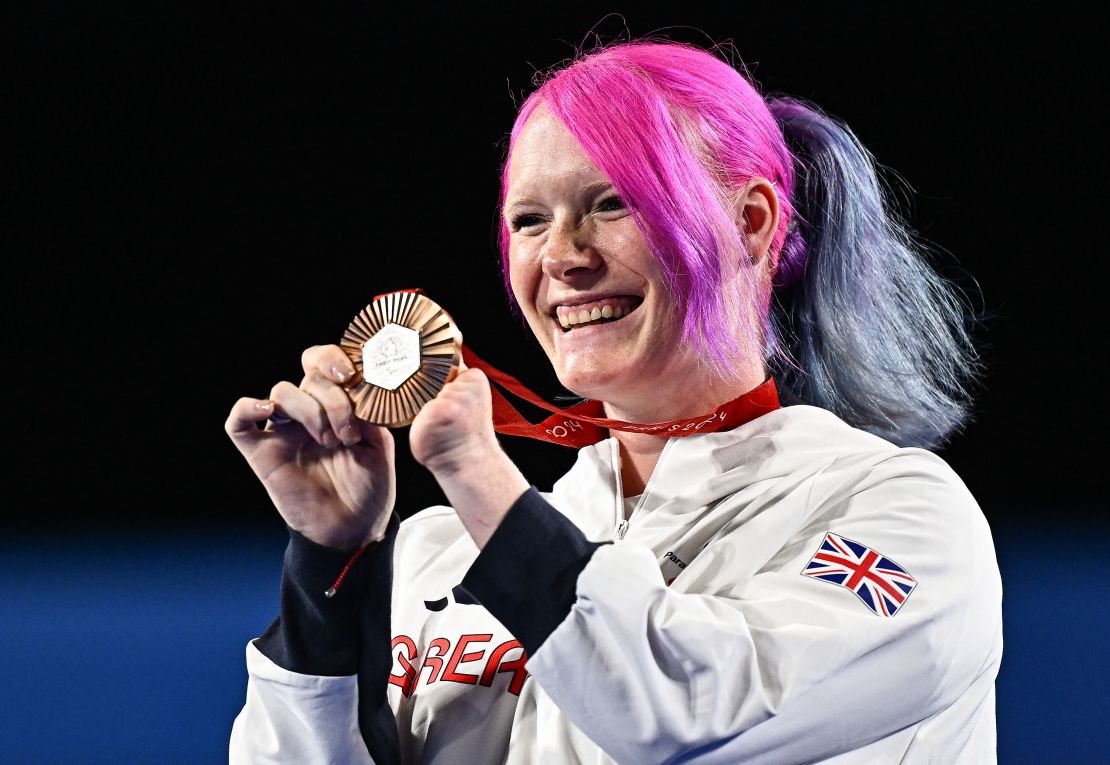 Jodie Grinham celebrates her bronze medal.