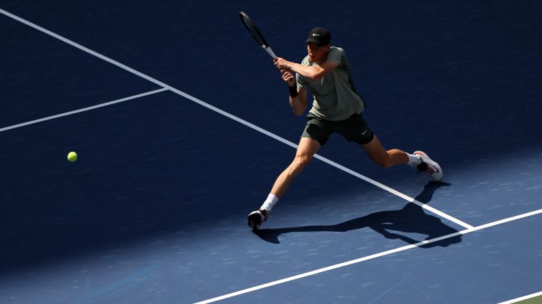 NEW YORK, NEW YORK - AUGUST 27: Jannik Sinner of Italy returns against Mackenzie McDonald of the United States during their Men's Singles First Round match on Day Two of the 2024 US Open at the USTA Billie Jean King National Tennis Center on August 27, 2024 in the Flushing neighborhood of the Queens borough of New York City. (Photo by Luke Hales/Getty Images)