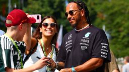 MONZA, ITALY - AUGUST 29: Lewis Hamilton of Great Britain and Mercedes takes a picture with a fan in the Paddock during previews ahead of the F1 Grand Prix of Italy at Autodromo Nazionale Monza on August 29, 2024 in Monza, Italy. (Photo by Clive Rose/Getty Images)