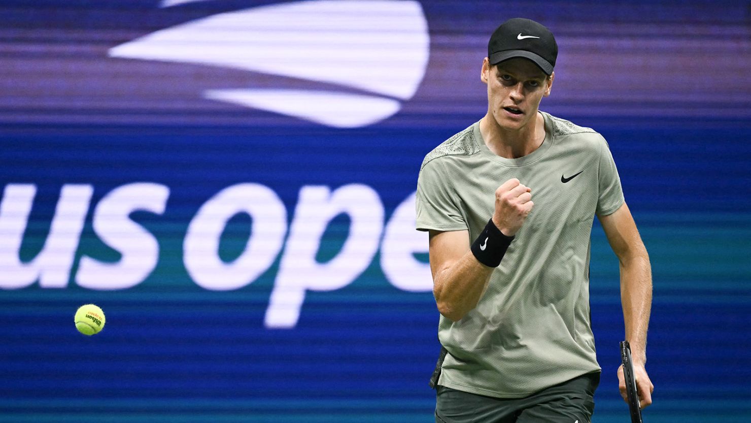 Italy's Jannik Sinner reacts to winning the first set against American Tommy Paul during their US Open round of 16 match.