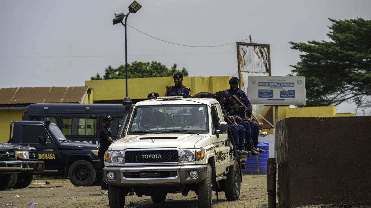 A Police vehicle with officers leave the Makala Prison in Kinshasa on September 3, 2024. An attempted jail break at the Democratic Republic of Congo's largest and chronically overcrowded prison this week has left at least 129 people dead, the interior minister said on September 3, 2024.
The circumstances around the bid to bust out of Makala prison in the capital Kinshasa in the early hours of September 2, 2024 remain unclear. (Photo by Hardy BOPE / AFP) (Photo by HARDY BOPE/AFP via Getty Images)