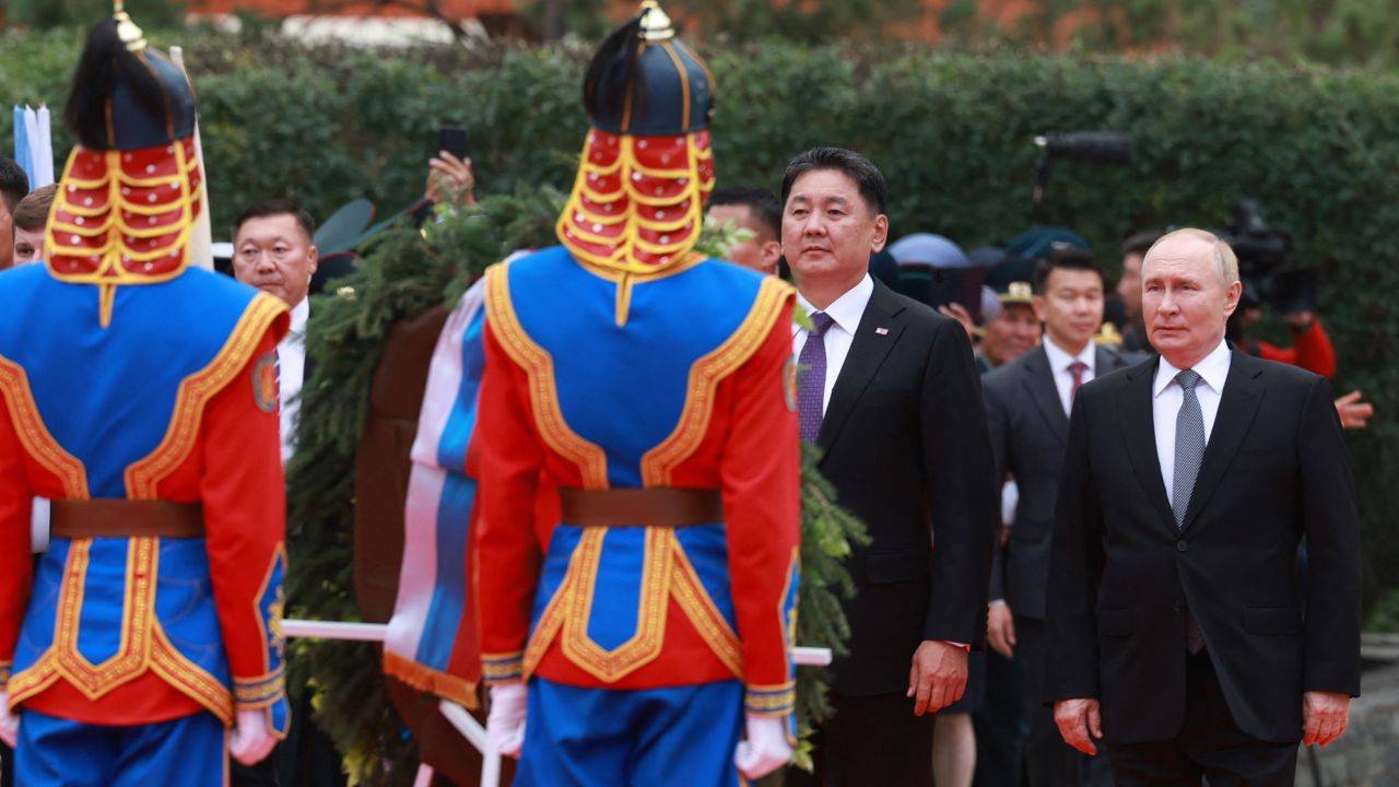 Russia's President Vladimir Putin (R) and Mongolia's President Ukhnaagiin Khurelsukh attend a wreath laying ceremony at a monument to Soviet Marshal Georgy Zhukov in Ulaanbaatar on September 3, 2024. (Photo by BYAMBASUREN BYAMBA-OCHIR / AFP) (Photo by BYAMBASUREN BYAMBA-OCHIR/AFP via Getty Images)