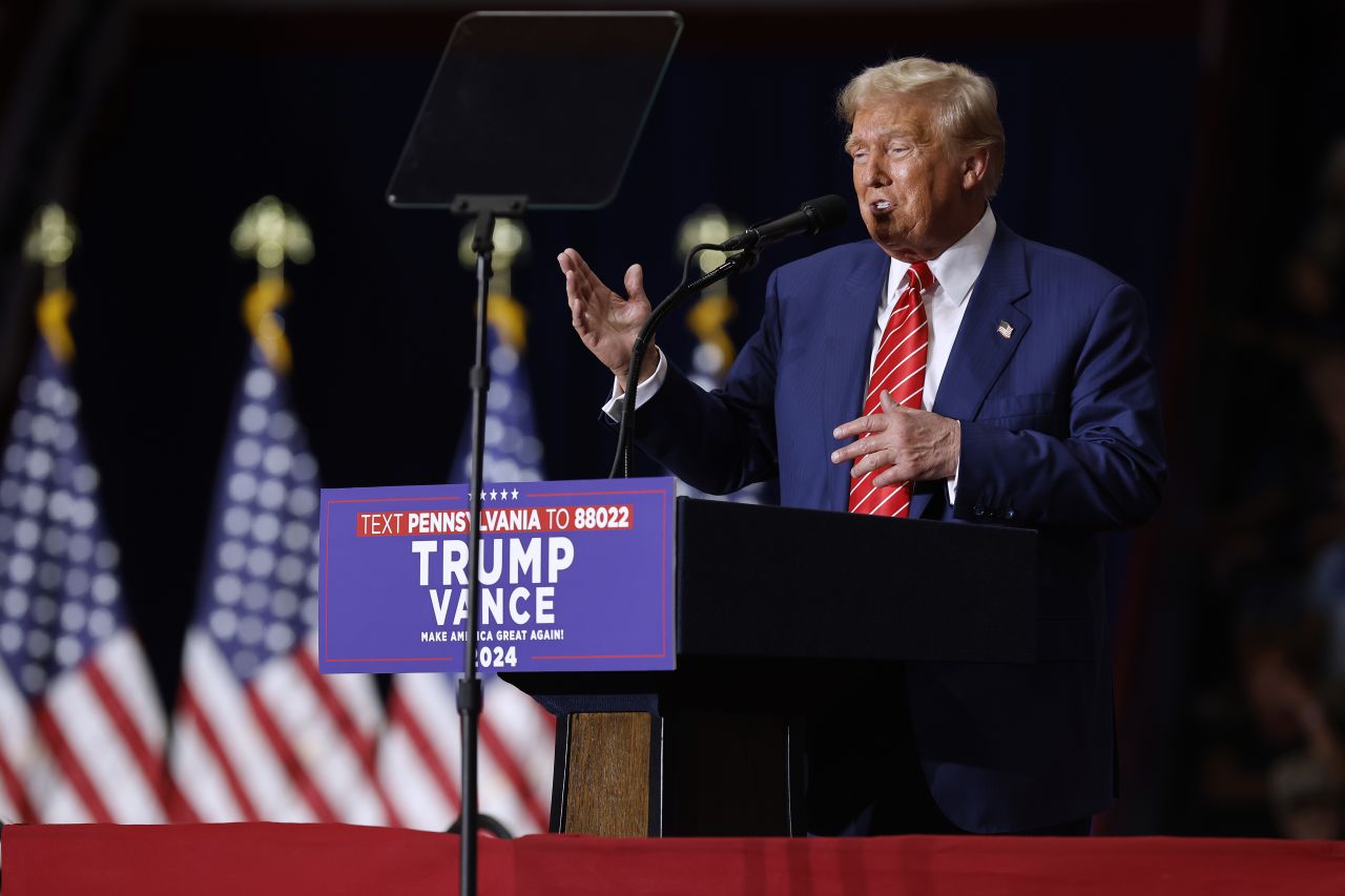 Former President Donald Trump takes the stage during a campaign rally on August 30, in Johnstown, Pennsylvania.