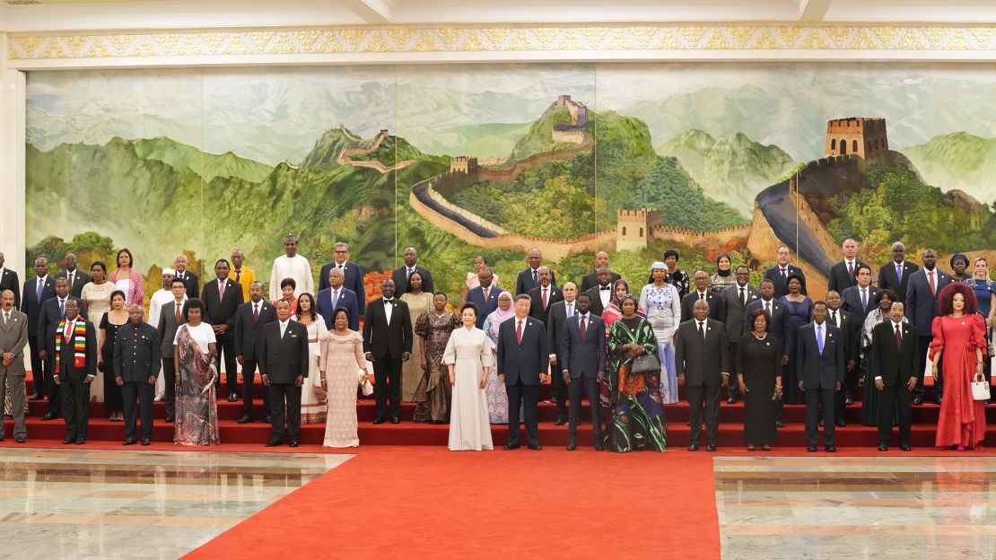 Chinese leader Xi Jinping and his wife Peng Liyuan pose for a group photo with leaders of African nations before a dinner reception in Beijing on September 4.