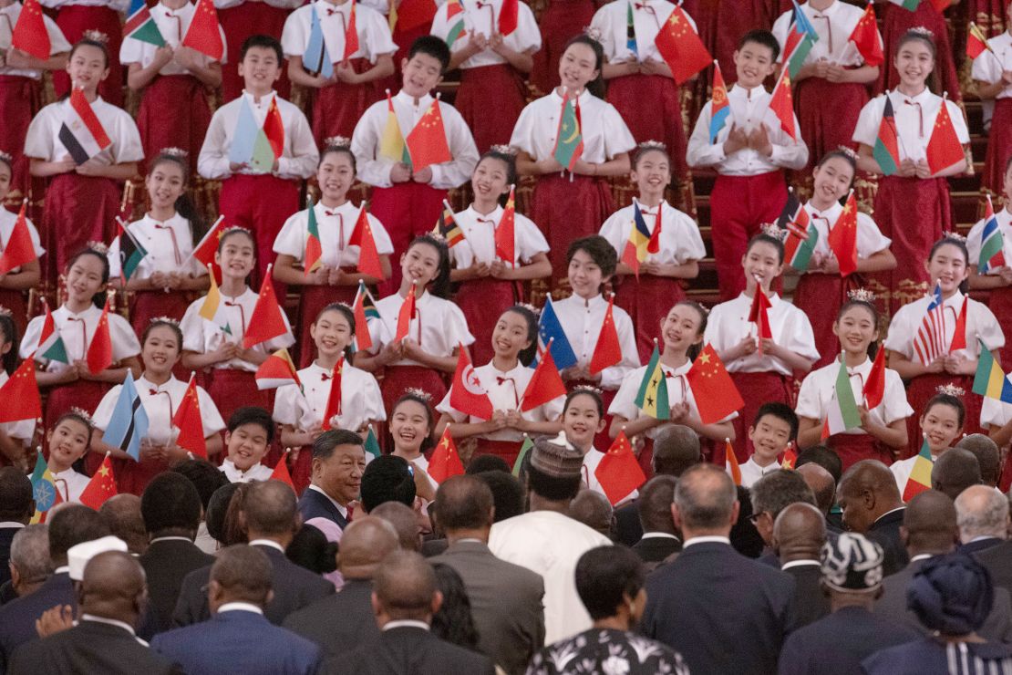 Xi and leaders of African countries listen to children sing during a reception at the Forum on China-Africa Cooperation (FOCAC) on September 4 in Beijing.