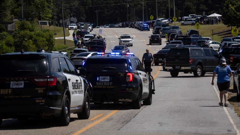 Mother of suspected gunman called Apalachee High School with warning after getting alarming text grandfather says – CNN