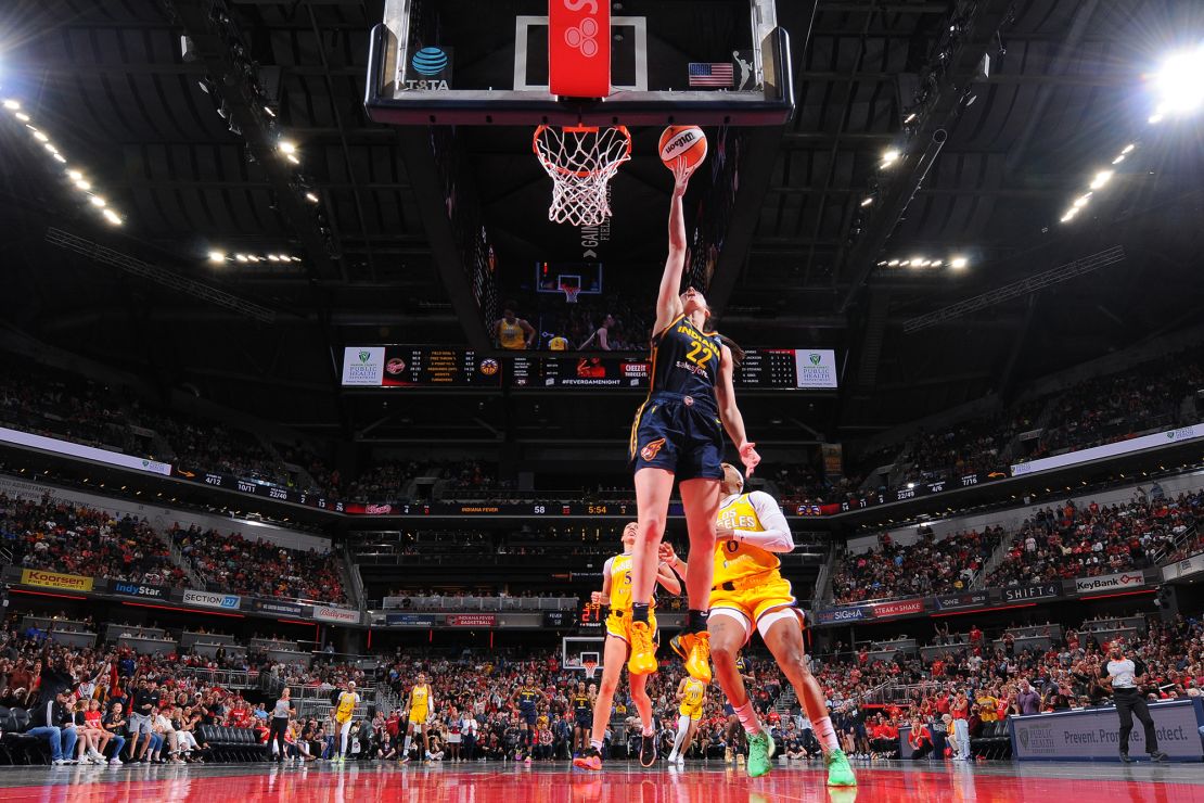 Clark drives to the basket during the game.