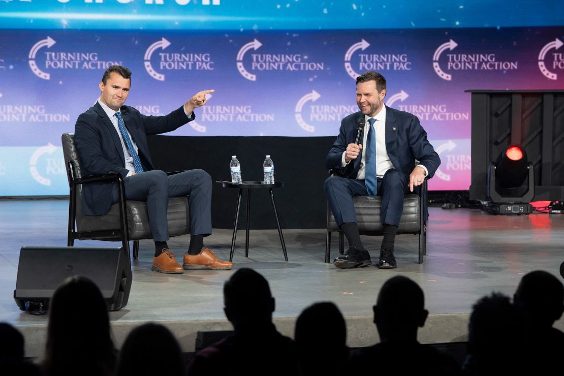 Turning Point executive director Charlie Kirk, left, moderates a conversation with Republican vice presidential candidate Sen. JD Vance during Turning Point Action's Chase the Vote campaign event at Generation Church in Mesa, Arizona, on September 4, 2024.