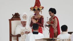 Pope Francis (L) leads a holy mass at the Gelora Bung Karno Stadium in Jakarta on September 5, 2024. (Photo by Adi WEDA / POOL / AFP) (Photo by ADI WEDA/POOL/AFP via Getty Images)