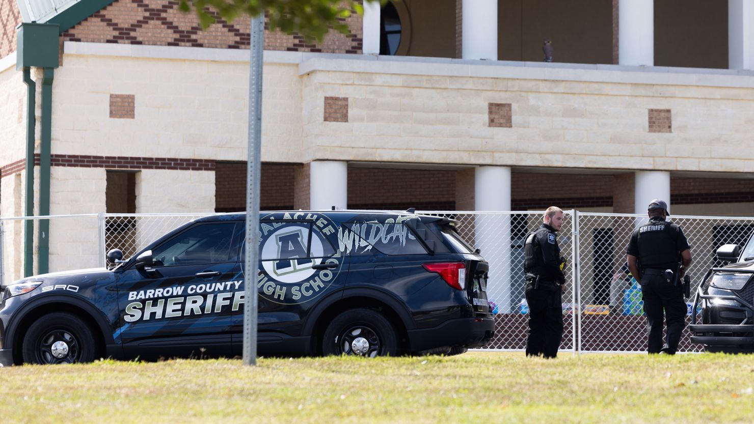 Officers stand outside Apalachee High School on September 5 in Winder, Georgia.