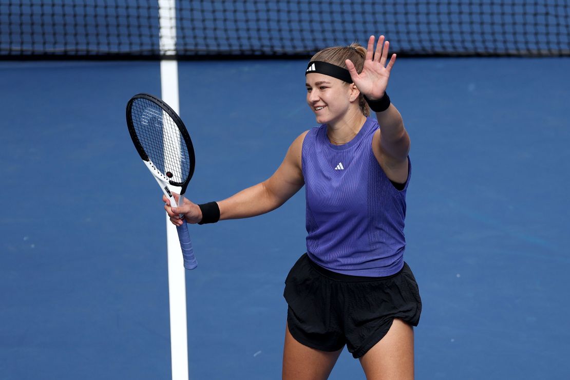 Muchová celebrates after her victory over Paolini.