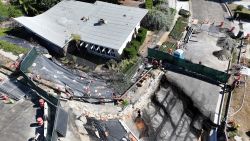 RANCHO PALOS VERDES, CALIFORNIA - SEPTEMBER 03: An aerial view shows damage resulting from ongoing land movement in the area that has forced power shutoffs to homes and California Gov. Gavin Newsom to declare a state of emergency on September 3, 2024 in Rancho Palos Verdes, California. Southern California Edison (SCE) cut off power to more than 200 homes in the area today and advised some residents to prepare to evacuate on short notice. A complex of landslides in the area, connected to ongoing ancient landslides, have accelerated following heavy rains in 2023, damaging homes and roadways.  (Photo by Mario Tama/Getty Images)