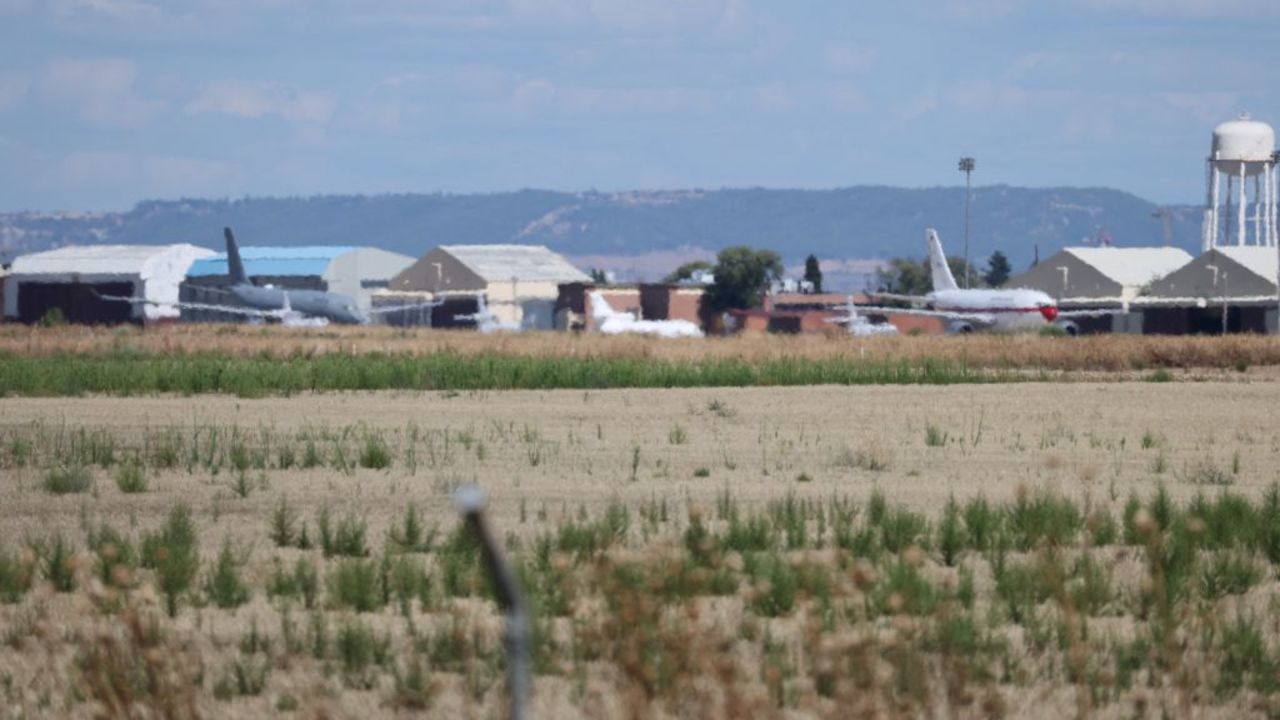 A picture taken on September 8, 2024 shows the Falcon plane (C) in which allegedly travelled Venezuelan opposition presidential candidate for the Plataforma Unitaria Democratica party Edmundo Gonzalez Urrutia from Venezuela, upon his arrival at Madrid's Torrejon de Ardoz military airport. Spain will "obviously" grant political asylum to Venezuelan opposition leader Edmundo Gonzalez Urrutia, Foreign Minister said on September 8, 2024. Gonzalez Urrutia left Venezuela on September 7 aboard a Spanish military aircraft after spending several days seeking refuge in the Spanish embassy in Caracas, where he fled after authorities issued an arrest warrant for him after he disputed the re-election of President Nicolas Maduro in July's election. (Photo by Thomas COEX / AFP) (Photo by THOMAS COEX/AFP via Getty Images)